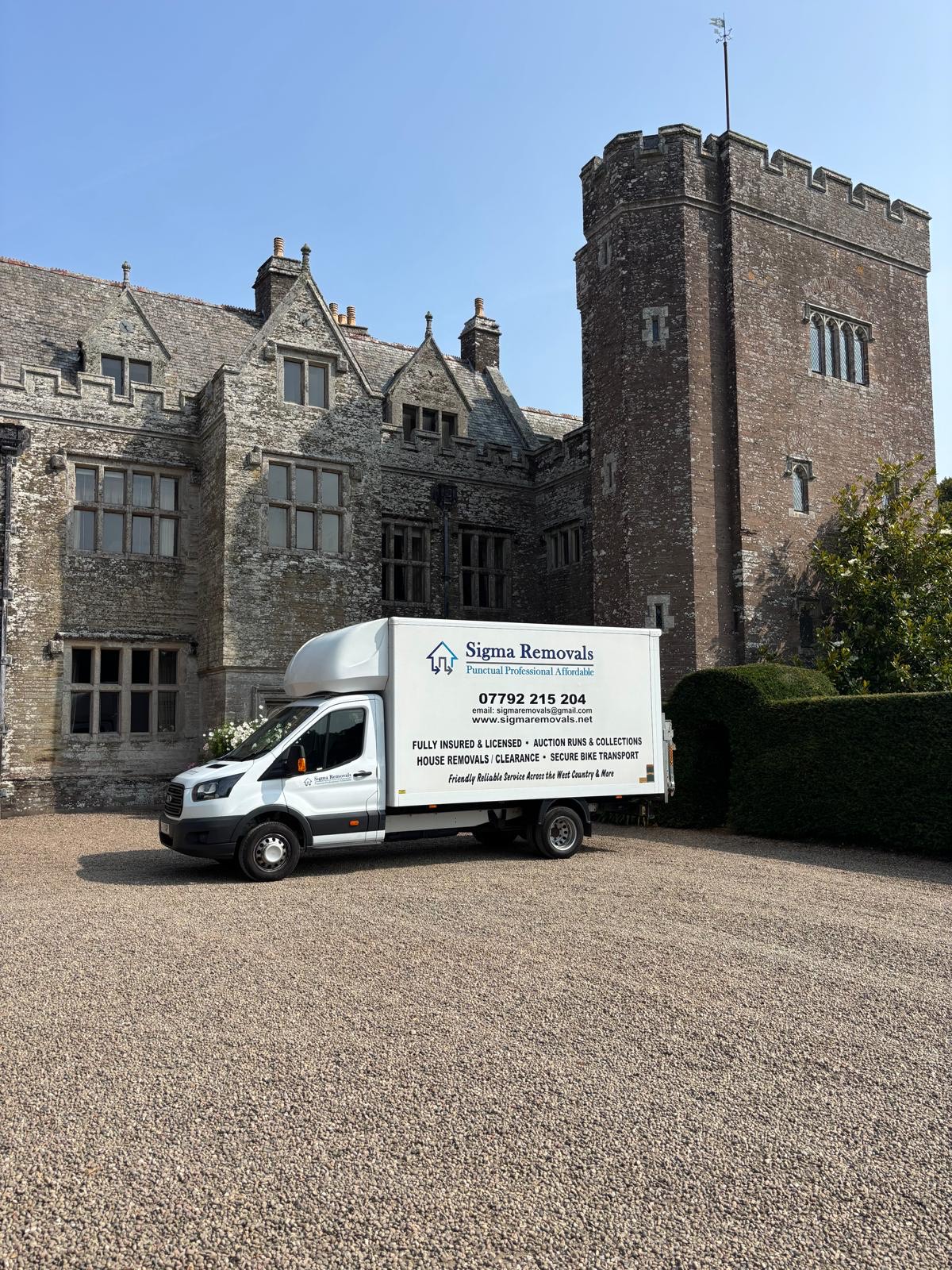 Professional removal team loading van